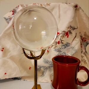 Glass ball on pedestal